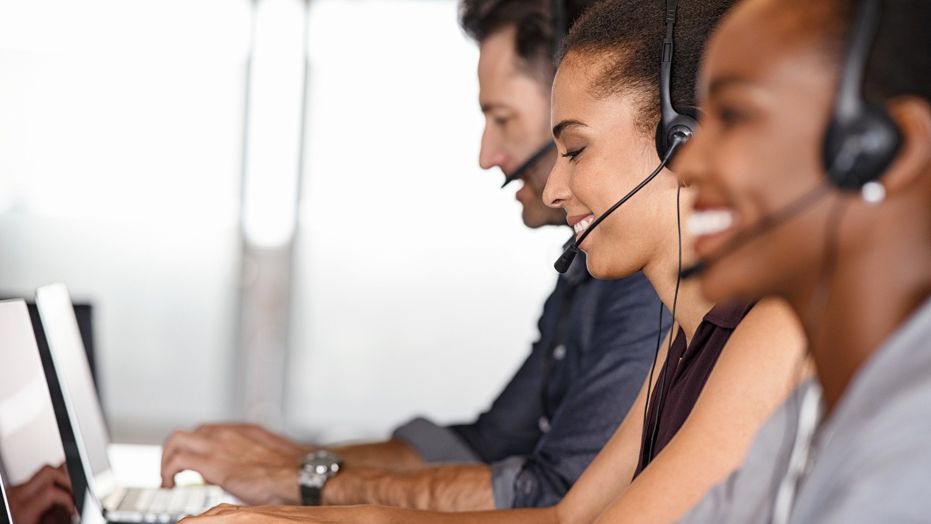 Support team working with headsets